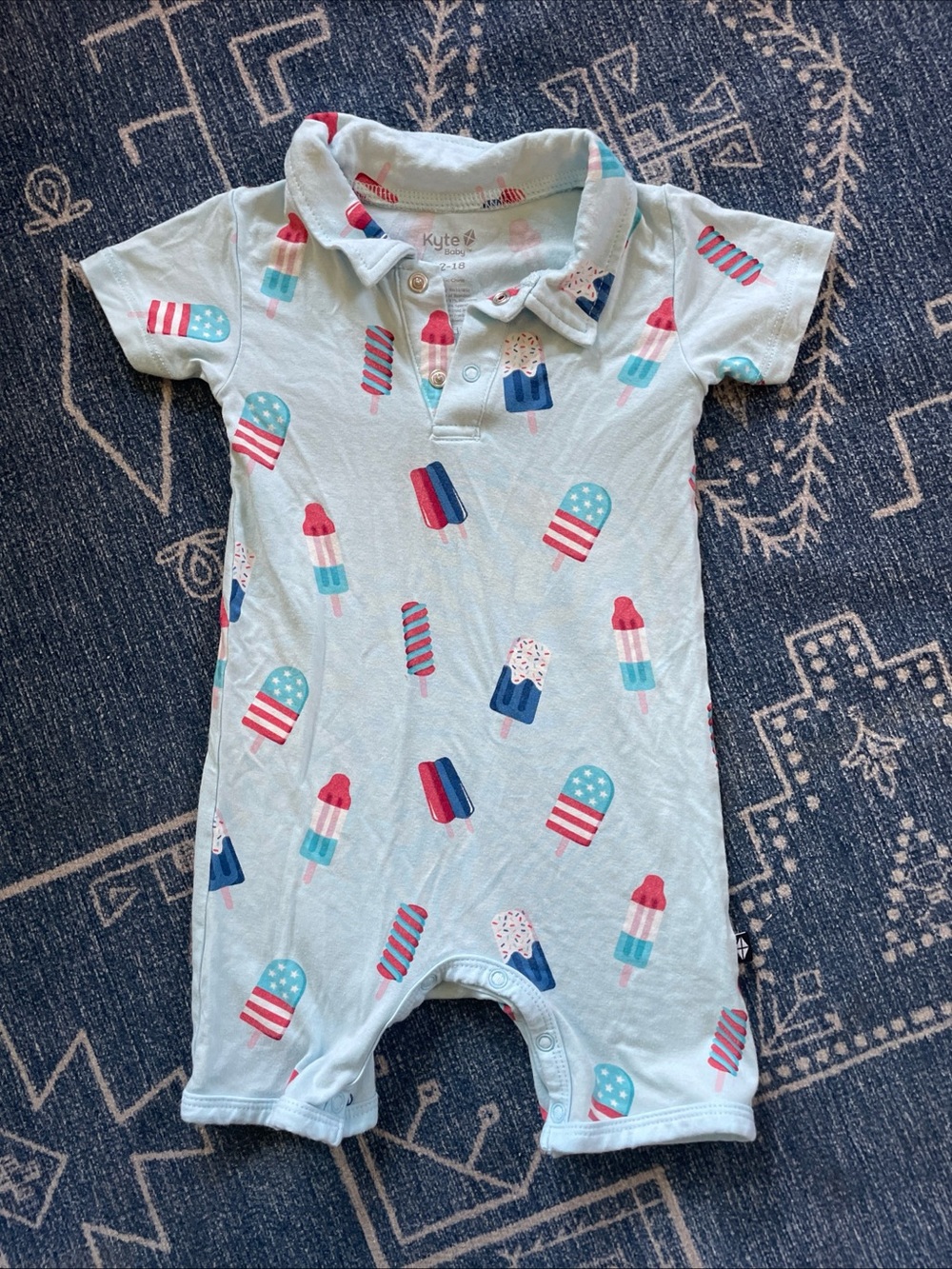 Kyte BABY 12-18M Light Blue Popsicle Polo Romper with Red, White and Blue Print